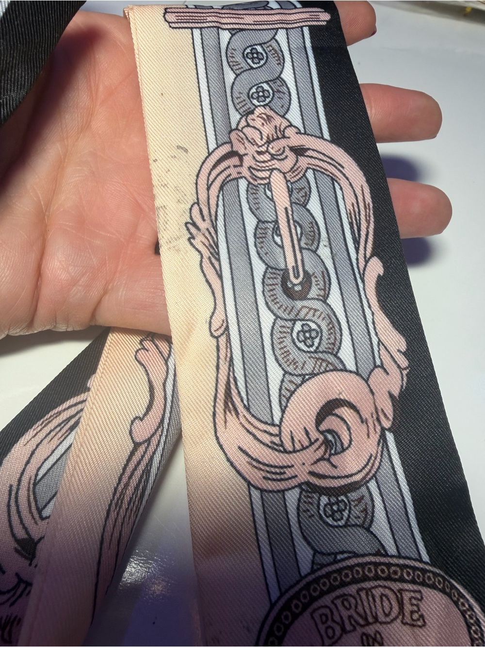 Silk-Twilly Pink and Black tied onto a leather lanyard holder/cell phone cord. - Picture 12 of 12